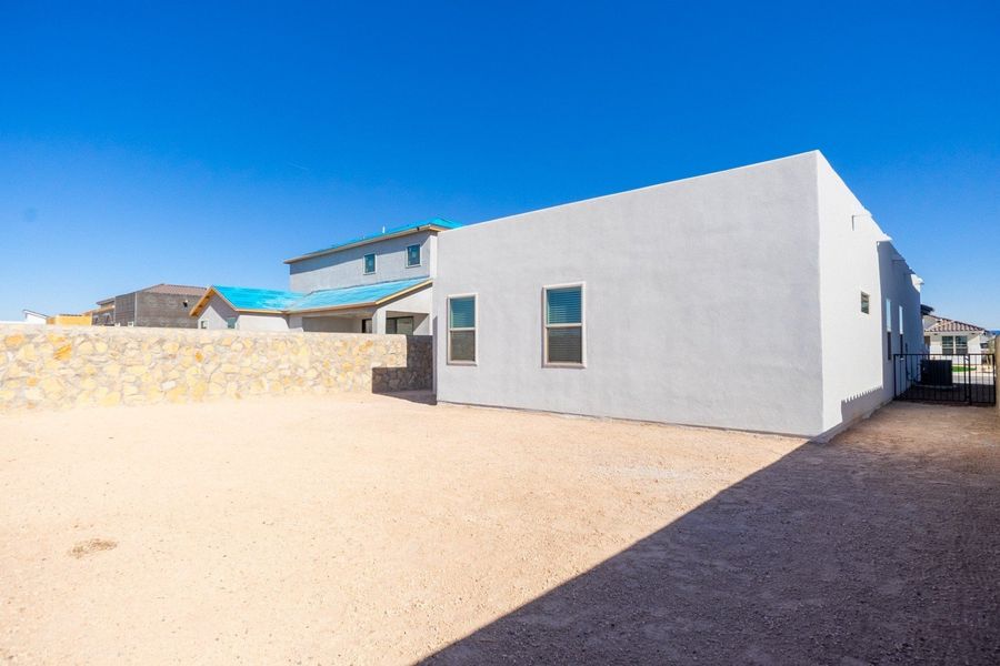 Exterior details and patio area of a home in Paseo Del Este, El Paso (Image 3).