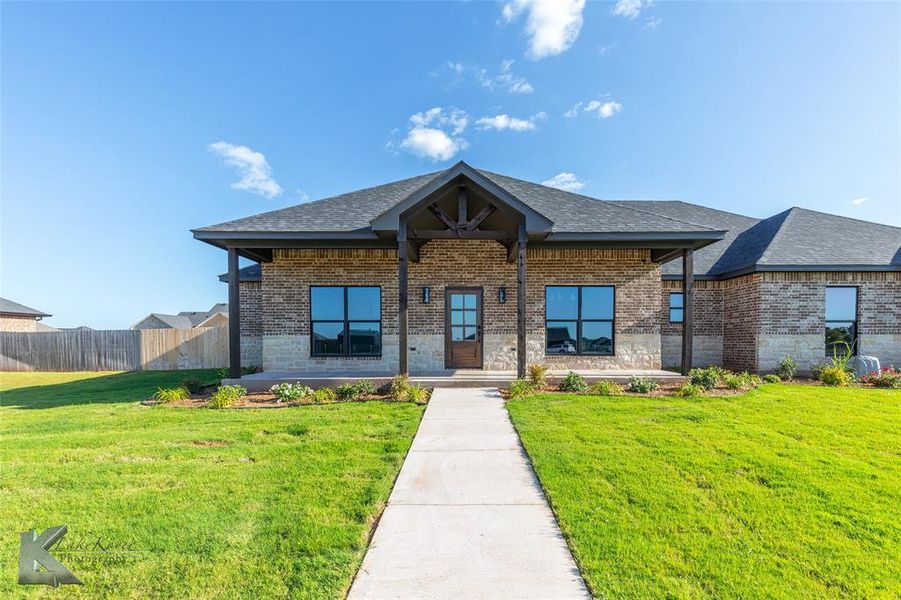 Front exterior of a new home in , Abilene, TX, highlighting curb appeal (Image 24).