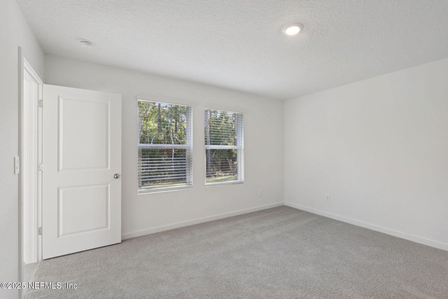 Spacious, unfurnished interior of a new home in Flagler Village - Classic Series, Palm Coast (Image 21).