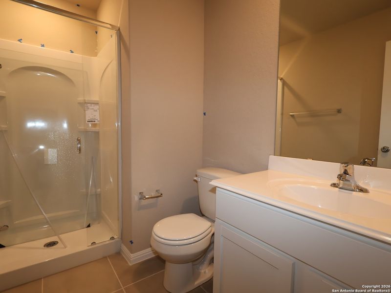 Furnished interior view inside a new home in Greenspoint Heights, Seguin (Image 15).