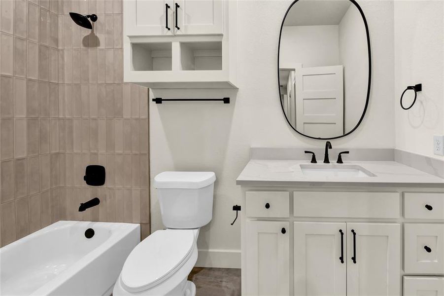 Bathroom with vanity and shower / washtub combination Bathroom with vanity and shower / washtub combination