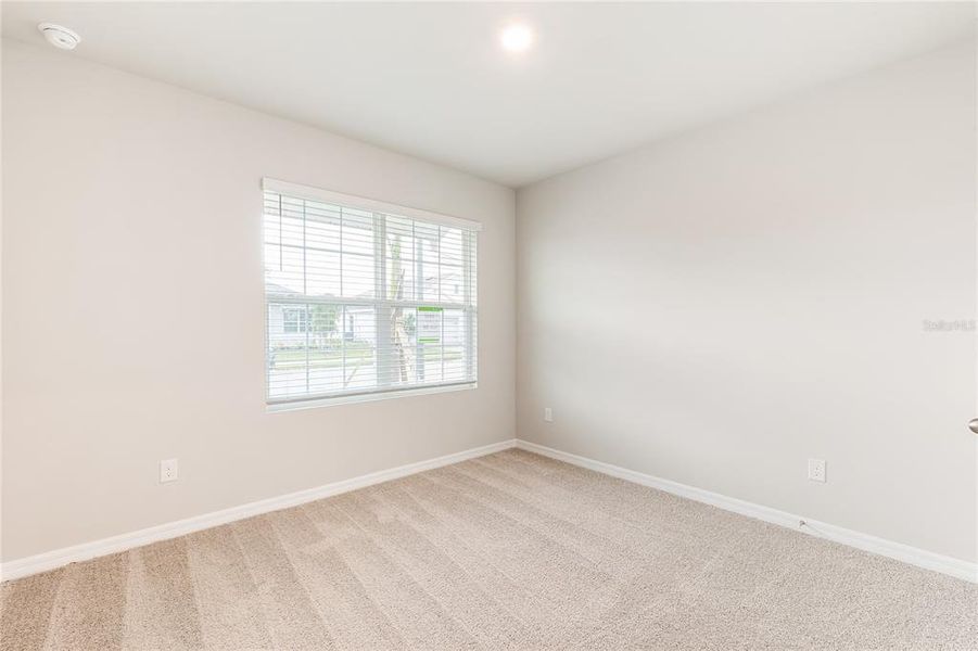 Spacious, unfurnished interior of a new home in Seagrass, Punta Gorda (Image 10).