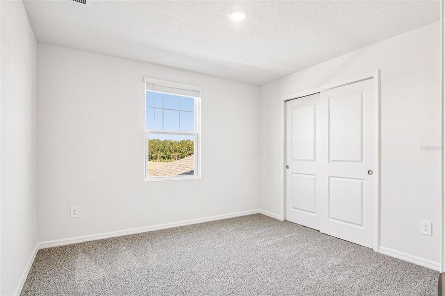 Spacious, unfurnished interior of a new home in Two Rivers - Classic Series, Zephyrhills (Image 22).