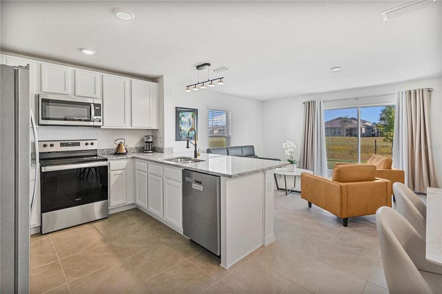 Furnished interior view inside a new home in Harmony West, St. Cloud (Image 42).