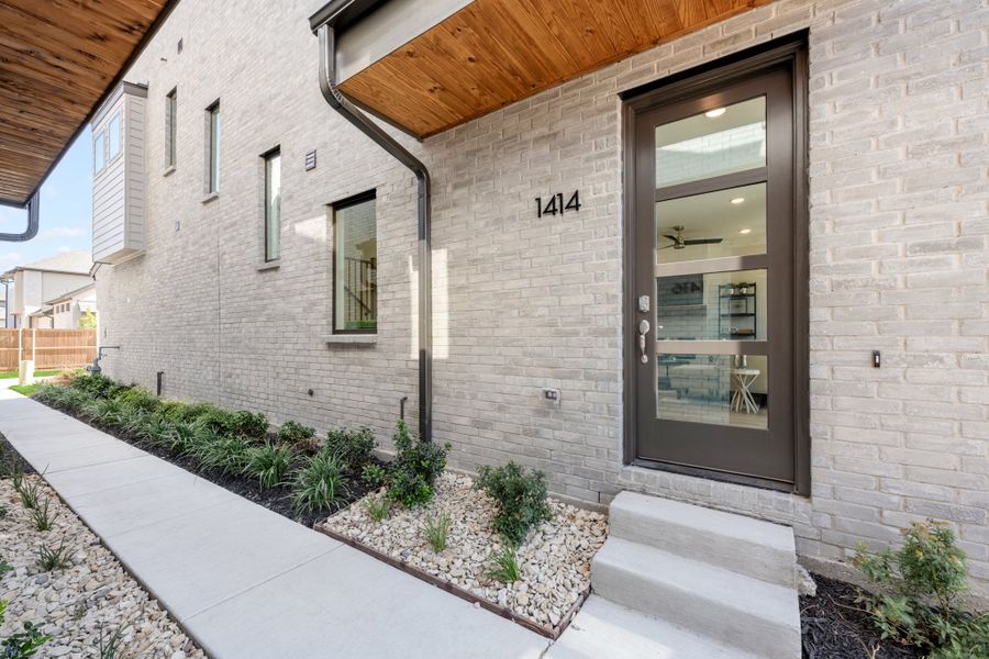 Exterior details and patio area of a home in Willow Grove Townhomes, Melissa (Image 29).