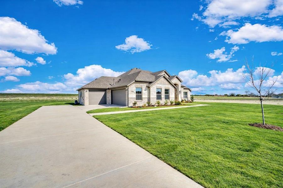 Front exterior of a new home in Levante, Waxahachie, TX, highlighting curb appeal (Image 24).