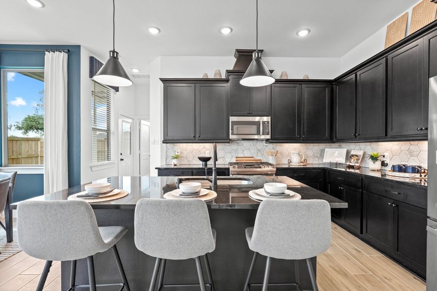 Furnished interior view inside a new home in Bridgeland, Cypress (Image 49).