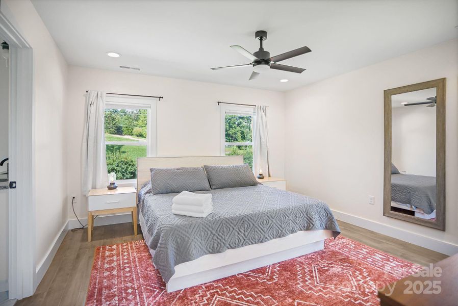 Oversized primary bedroom with walk-in closet