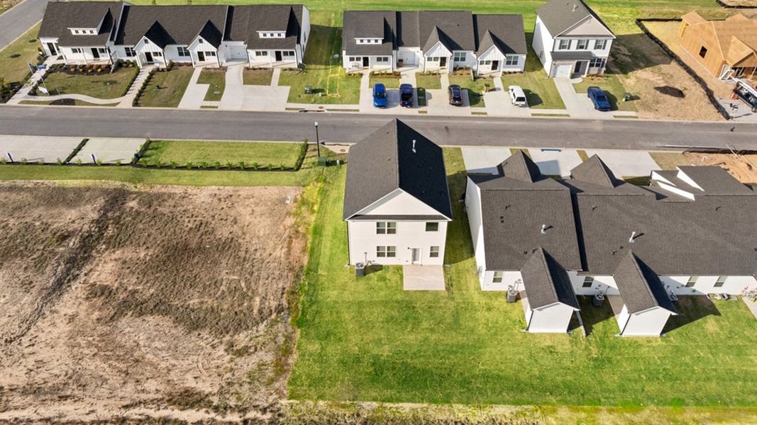 Exterior details and patio area of a home in The Islands, Beech Island (Image 26).