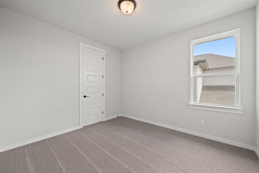 Spacious, unfurnished interior of a new home in Wolf Ranch, Georgetown (Image 48).