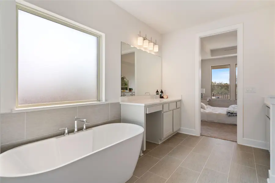 Relax and unwind in the deep soaking tub after a long day.