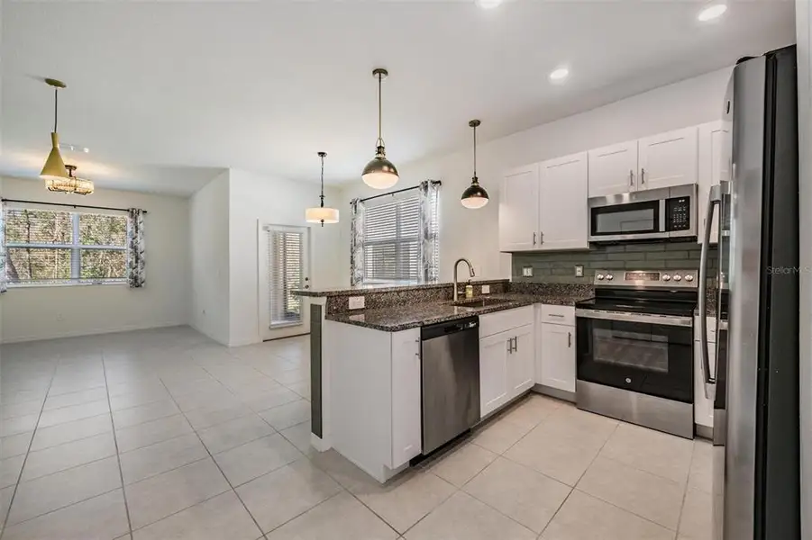 Furnished interior view inside a new home in , Land O' Lakes (Image 7).
