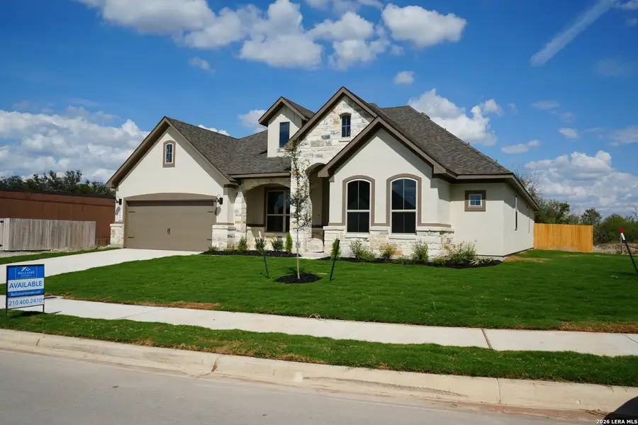 Front exterior of a new home in Buffalo Crossing, Schertz, TX, highlighting curb appeal (Image 1). Front exterior of a new home in Buffalo Crossing, Schertz, TX, highlighting curb appeal (Image 1).