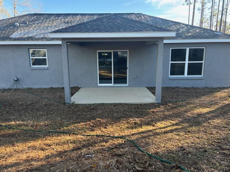 Exterior details and patio area of a home in , Citrus Springs (Image 17).