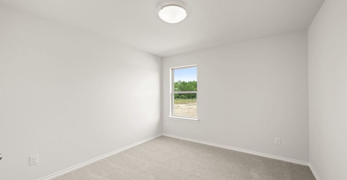 Representative exterior photo of a completed home built from the Boston by Impression Homes in Baker Farms, Cleburne, TX (Image 15).