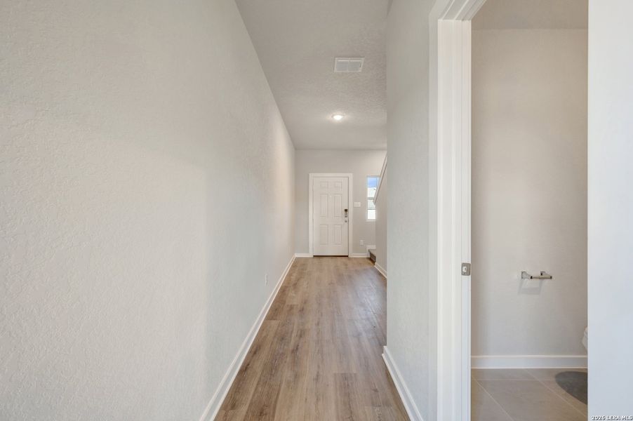 Spacious, unfurnished interior of a new home in Winding Brook, San Antonio (Image 47).