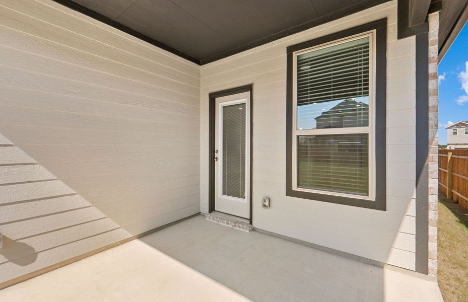 Exterior details and patio area of a home in Saddleback at Santa Rita Ranch, Liberty Hill (Image 24). Exterior details and patio area of a home in Saddleback at Santa Rita Ranch, Liberty Hill (Image 24).