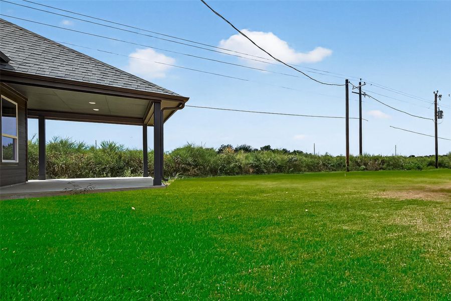 Front exterior of a new home in , Prairie View, TX, highlighting curb appeal (Image 23).