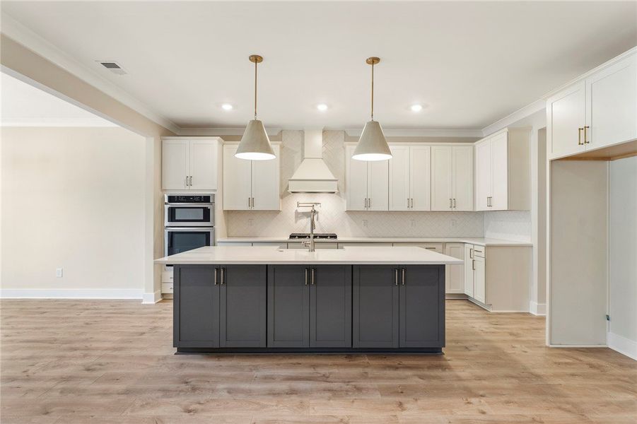 This mud room features built-in shelving and seati