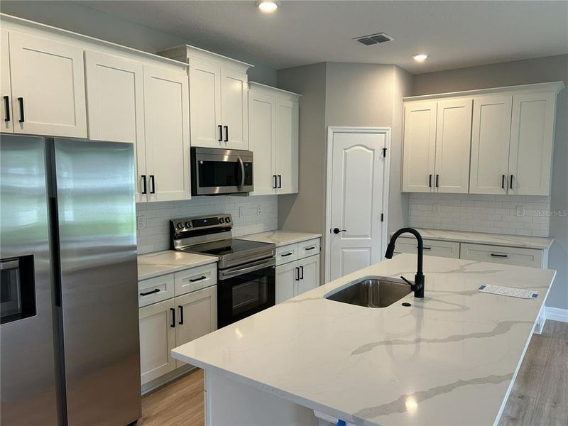 Furnished interior view inside a new home in , Dunnellon (Image 11).