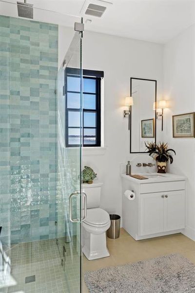 Pool Bathroom with vanity and a stall shower