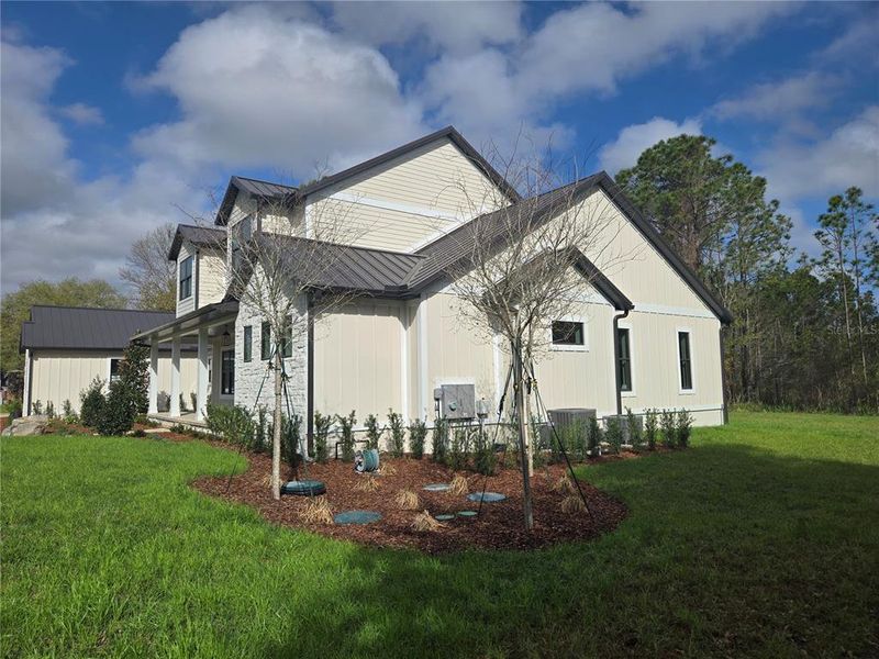 Front exterior of a new home in , Howey-in-the-Hills, FL, highlighting curb appeal (Image 11).