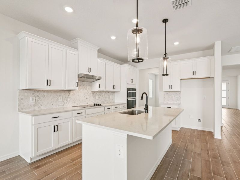 Furnished interior view inside a new home in Oakfield Trails - Signature Series, Parrish (Image 3). Furnished interior view inside a new home in Oakfield Trails - Signature Series, Parrish (Image 3).
