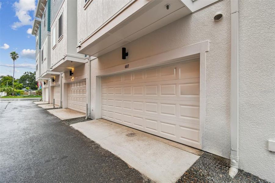 Front exterior of a new home in Towns at Union, St. Petersburg, FL, highlighting curb appeal (Image 23).