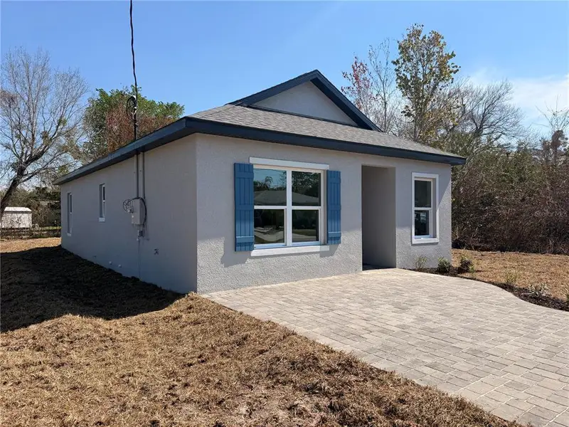 Exterior details and patio area of a home in , Sanford (Image 3).