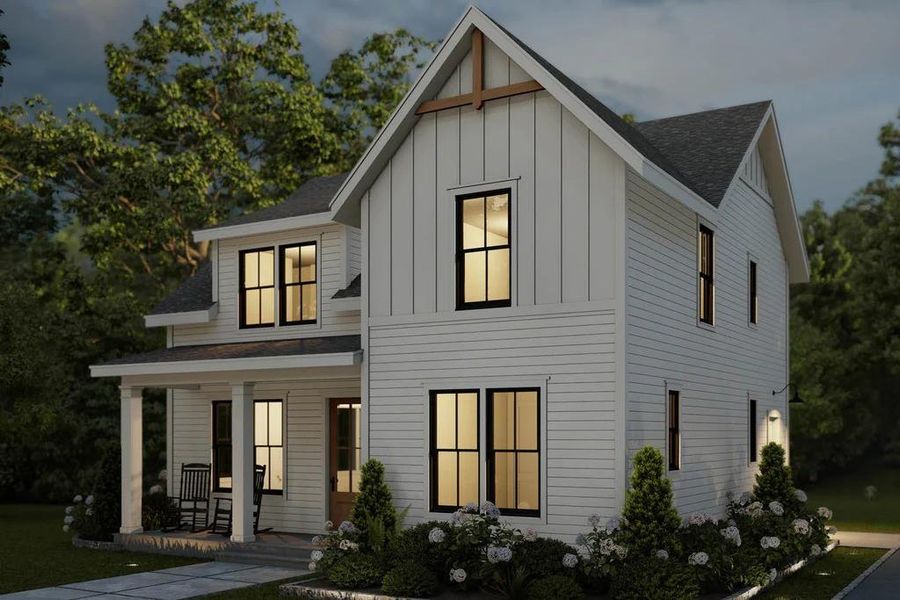 Modern farmhouse with a shingled roof, board and batten siding, a porch, and a front yard