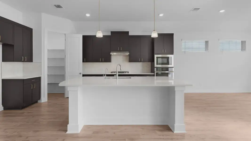 Furnished interior view inside a new home in Santa Rita Ranch, Liberty Hill (Image 6).