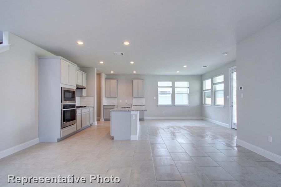 Representative unfurnished interior of a home built from the Clear Creek 1950 by Brohn Homes in Clear Creek, Round Rock (Image 9).