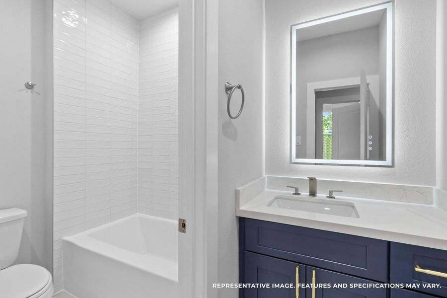Just steps away, your full bathroom is modern and polished, with sleek finishes, a tub for soaking, and a vanity that makes everyday routines a pleasure.