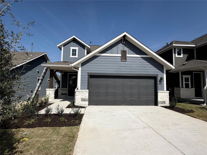 Front exterior of a new home in Cannon Ranch 40s, Dripping Springs, TX, highlighting curb appeal (Image 1). Front exterior of a new home in Cannon Ranch 40s, Dripping Springs, TX, highlighting curb appeal (Image 1).