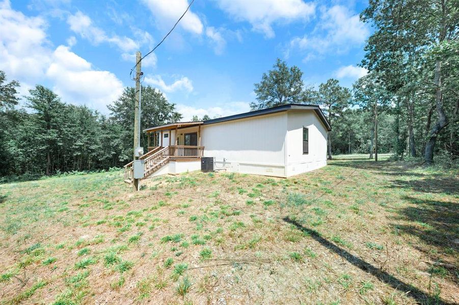 Front exterior of a new home in , Gilmer, TX, highlighting curb appeal (Image 17). Front exterior of a new home in , Gilmer, TX, highlighting curb appeal (Image 17).