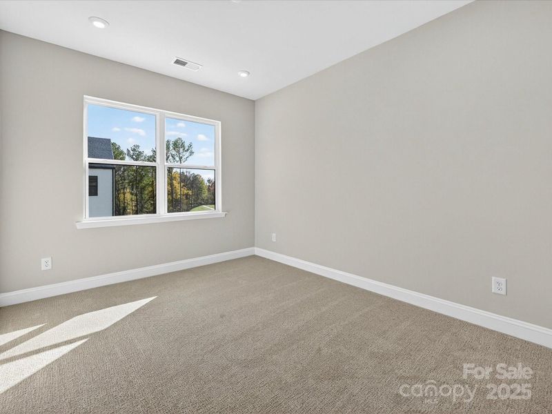 Secondary Bedroom Facing Mature Trees.