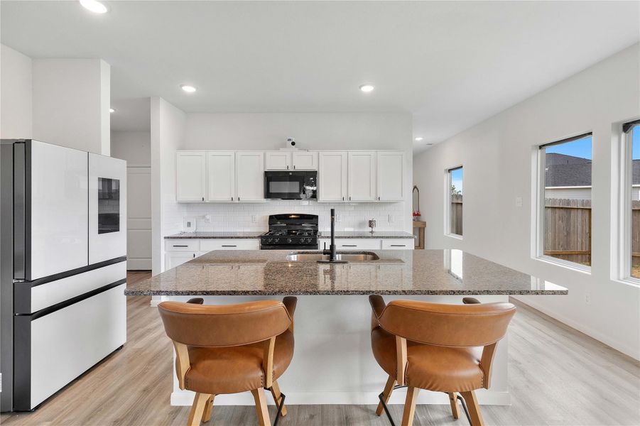 Furnished interior view inside a new home in Sweetgrass Village, Crosby (Image 10).