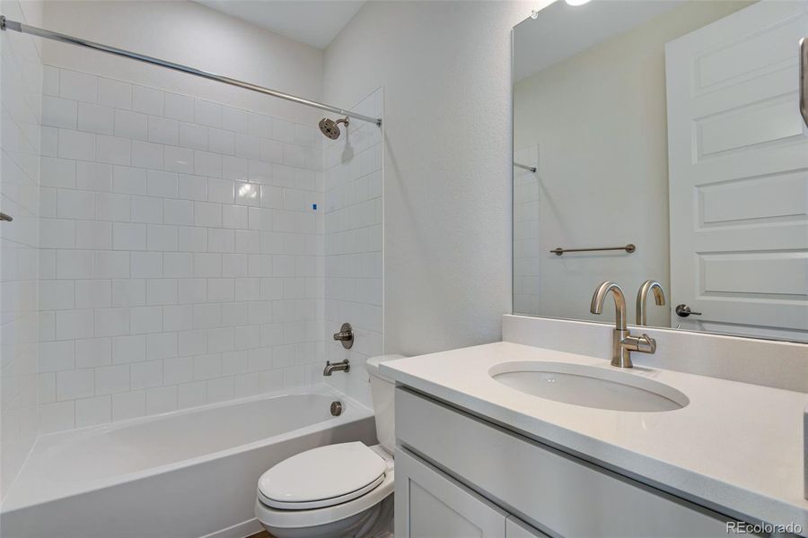 Furnished interior view inside a new home in Prelude at The Aurora Highlands, Aurora (Image 12).