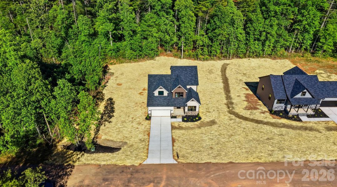 Front exterior of a new home in , Morganton, NC, highlighting curb appeal (Image 17). Front exterior of a new home in , Morganton, NC, highlighting curb appeal (Image 17).