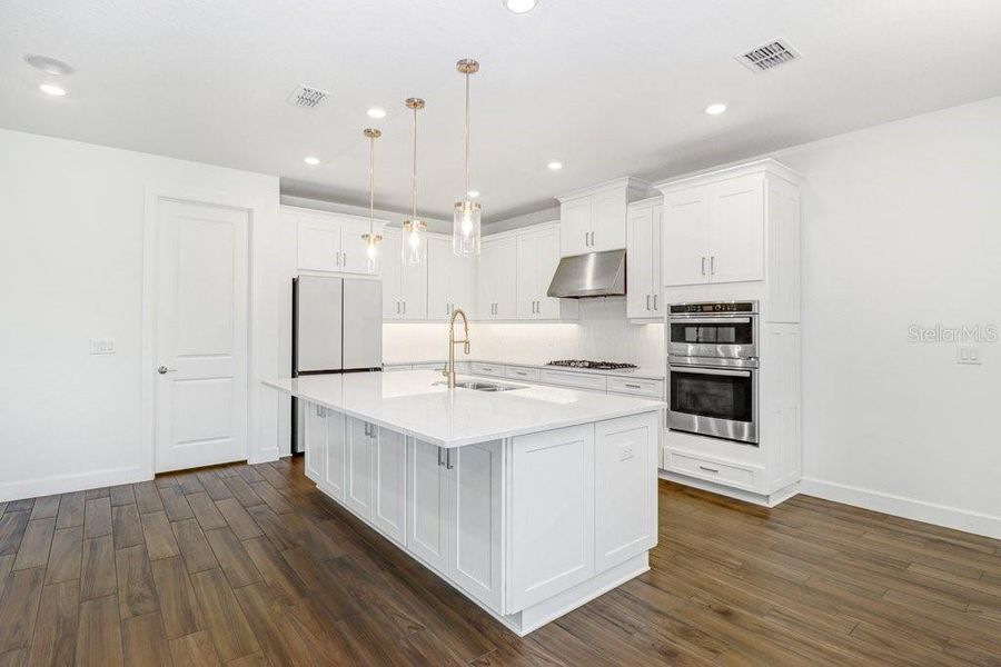 Furnished interior view inside a new home in Esplanade at Artisan Lakes, Palmetto (Image 11).