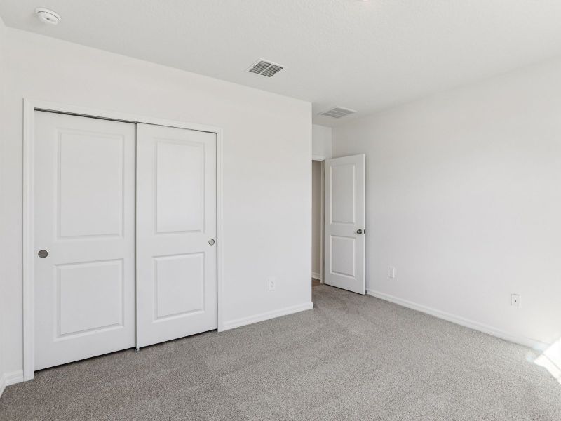 Spacious, unfurnished interior of a new home in Salt Meadows - Classic Series, Parrish (Image 14).