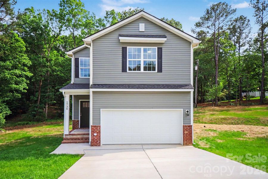 Front exterior of a new home in , Lancaster, SC, highlighting curb appeal (Image 16). Front exterior of a new home in , Lancaster, SC, highlighting curb appeal (Image 16).