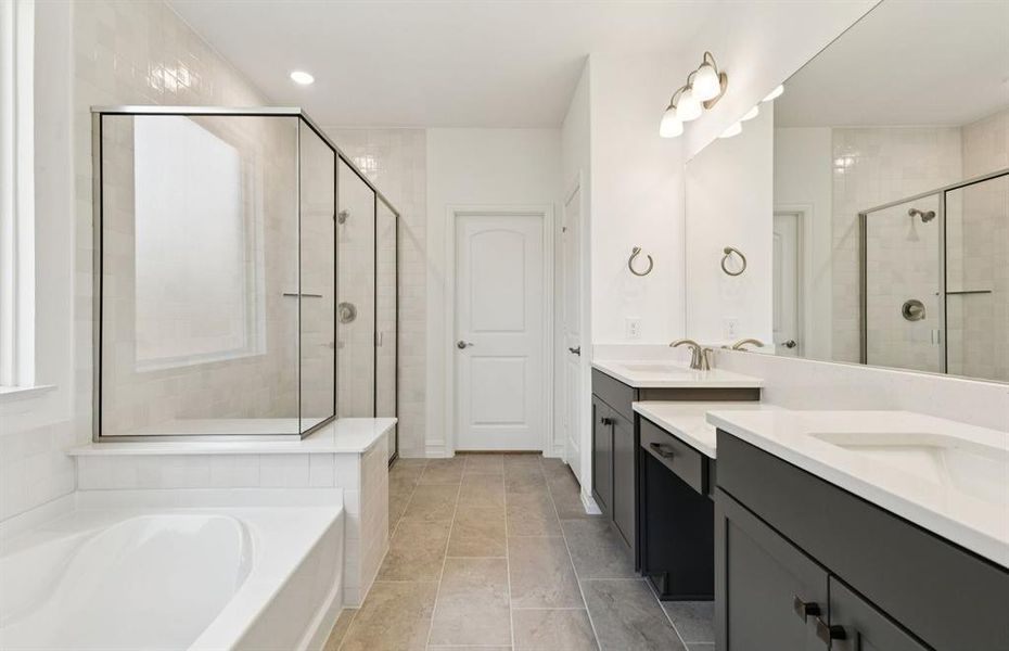 Spacious owner's bathroom*real home pictured