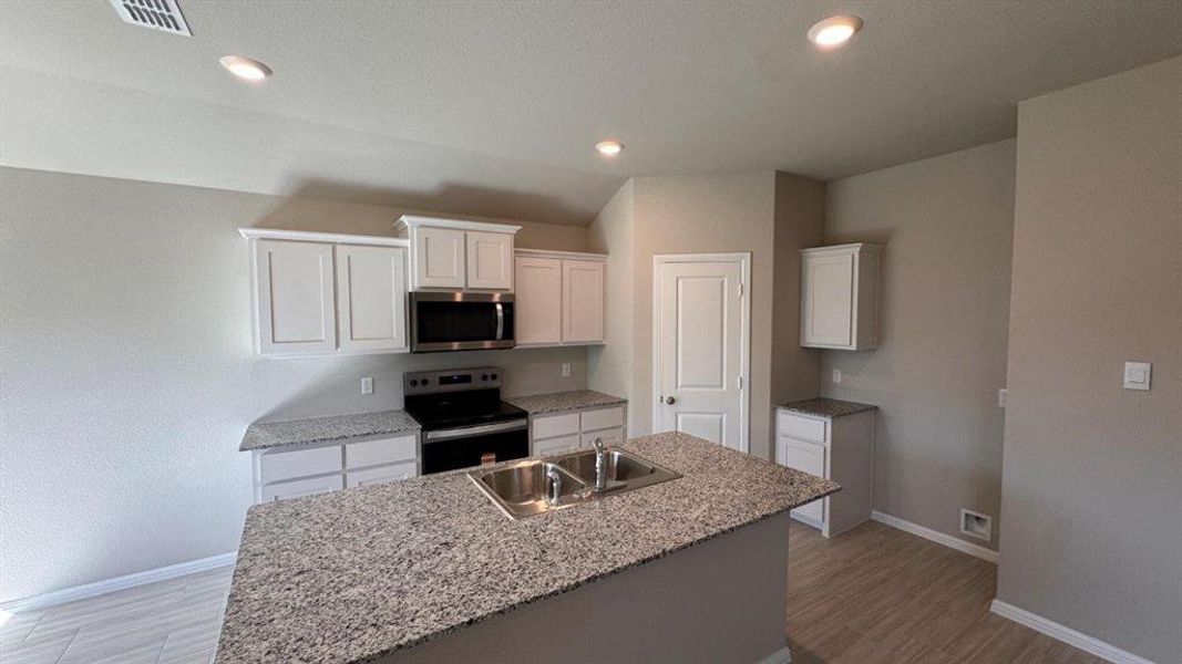 Kitchen - All Home and community information, including pricing, included features, terms, availability and amenities, are subject to change at any time without notice or obligation. All Drawings, pictures, photographs, video, square footages, floor plans, elevations, features, colors and sizes are approximate for illustration purposes only and will vary from the homes as built. Kitchen - All Home and community information, including pricing, included features, terms, availability and amenities, are subject to change at any time without notice or obligation. All Drawings, pictures, photographs, video, square footages, floor plans, elevations, features, colors and sizes are approximate for illustration purposes only and will vary from the homes as built.