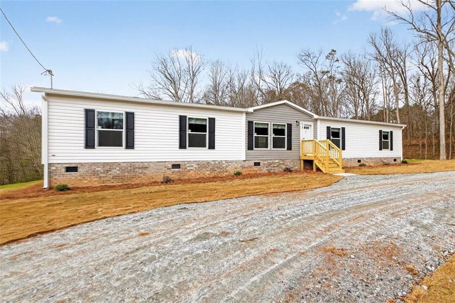 Exterior details and patio area of a home in , Royston (Image 21).