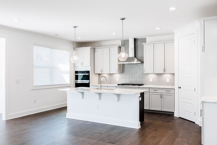 Furnished interior view inside a new home in High Grove Oaks, Fuquay Varina (Image 8). Furnished interior view inside a new home in High Grove Oaks, Fuquay Varina (Image 8).