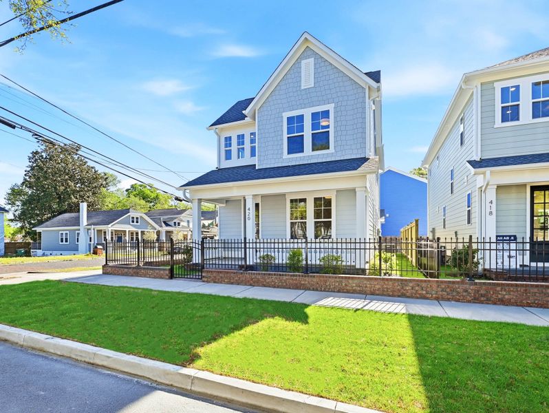 Representative exterior photo of a completed home built from the The Remington by RobuckHomes in Downtown Wilmington Collective, Wilmington, NC (Image 33). Representative exterior photo of a completed home built from the The Remington by RobuckHomes in Downtown Wilmington Collective, Wilmington, NC (Image 33).