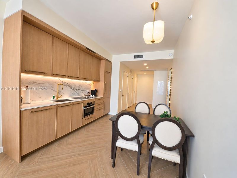 Furnished interior view inside a new home in NoMad Residences, Miami (Image 8).