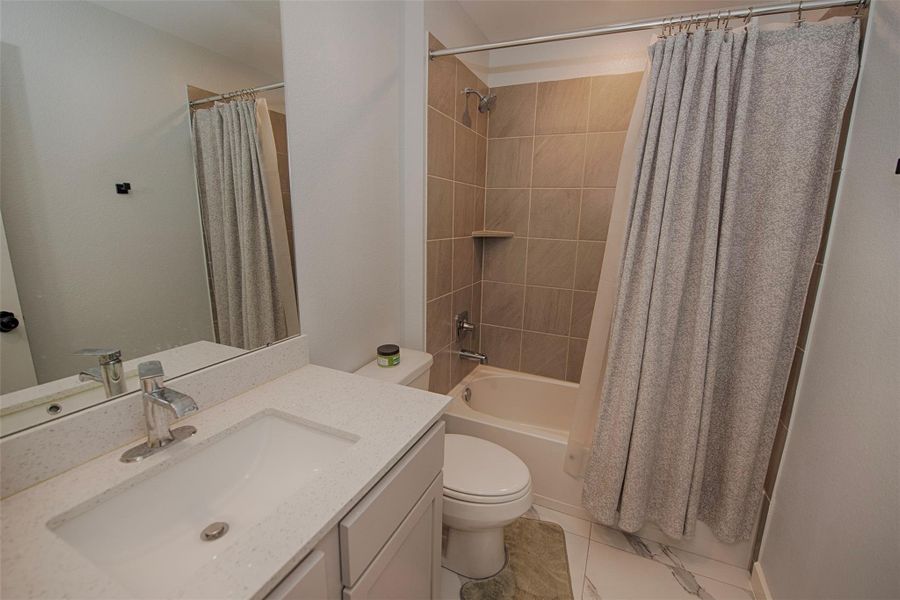 Between the 2nd and 3rd bedroom is an additional bathroom with combo bath and shower. Between the 2nd and 3rd bedroom is an additional bathroom with combo bath and shower.