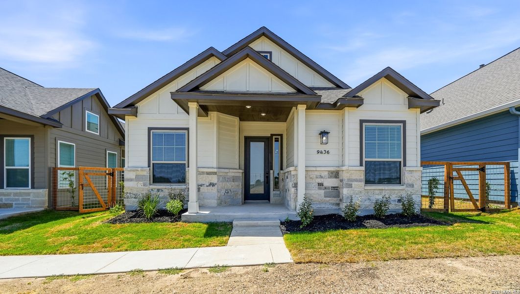 Front exterior of a new home in The Crossvine, Schertz, TX, highlighting curb appeal (Image 22).